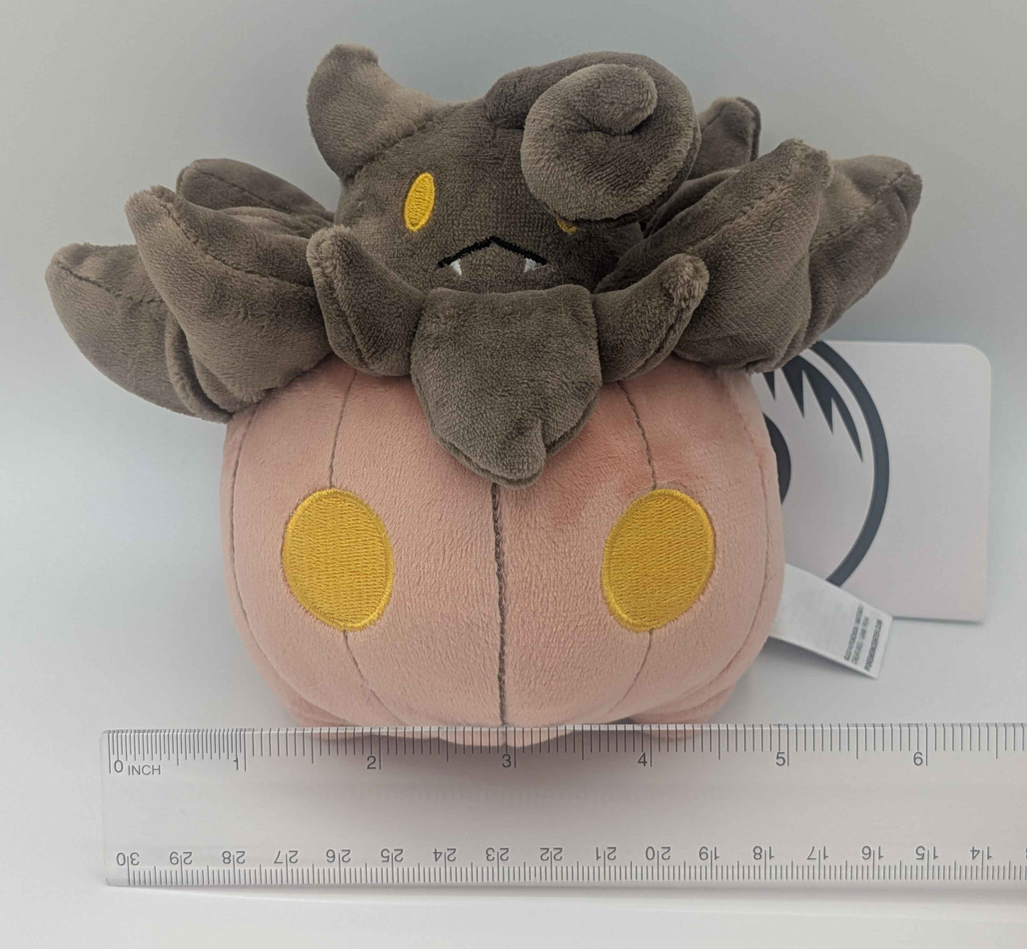 Plush toy of the Pokemon Pumpkaboo